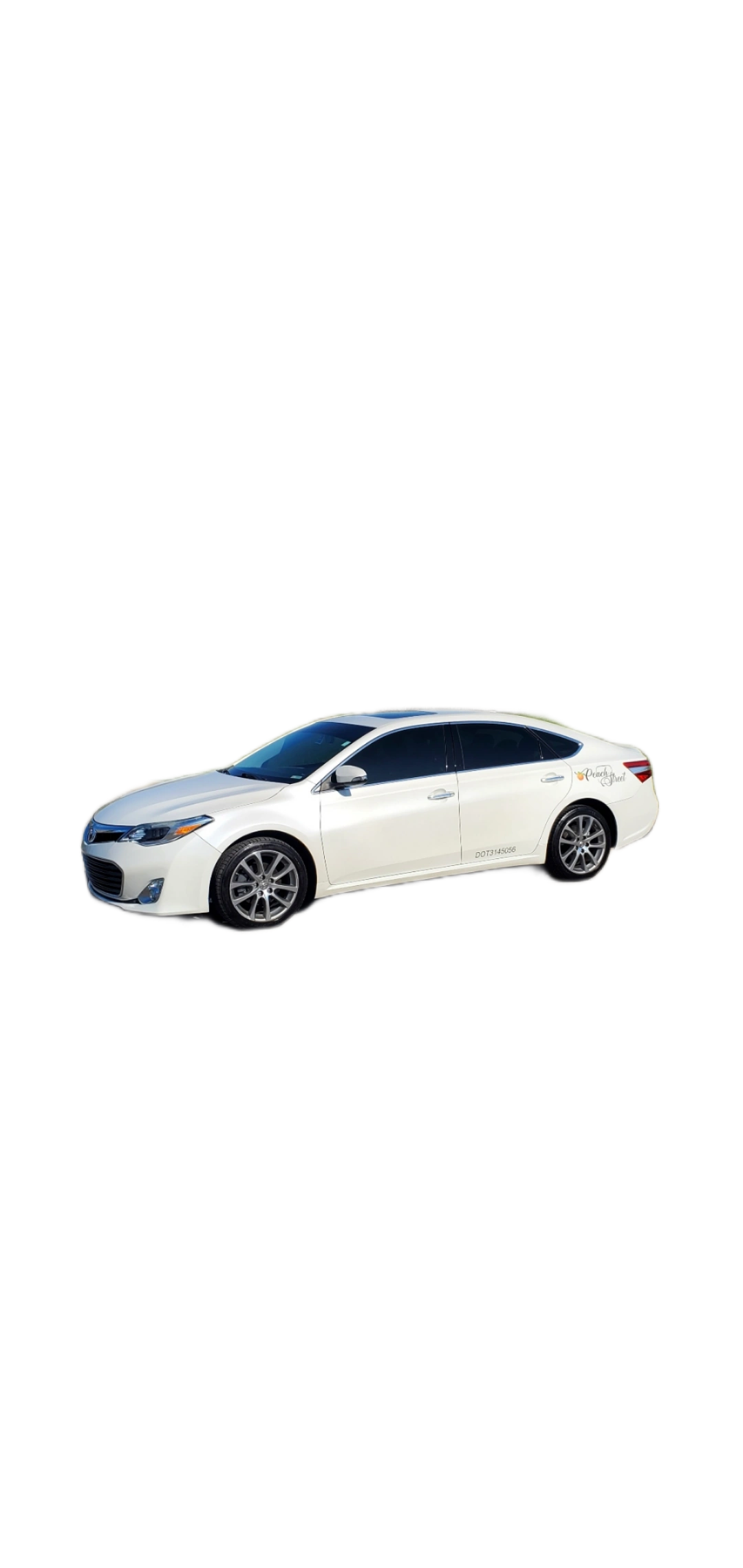 White Toyota Avalon luxury sedan